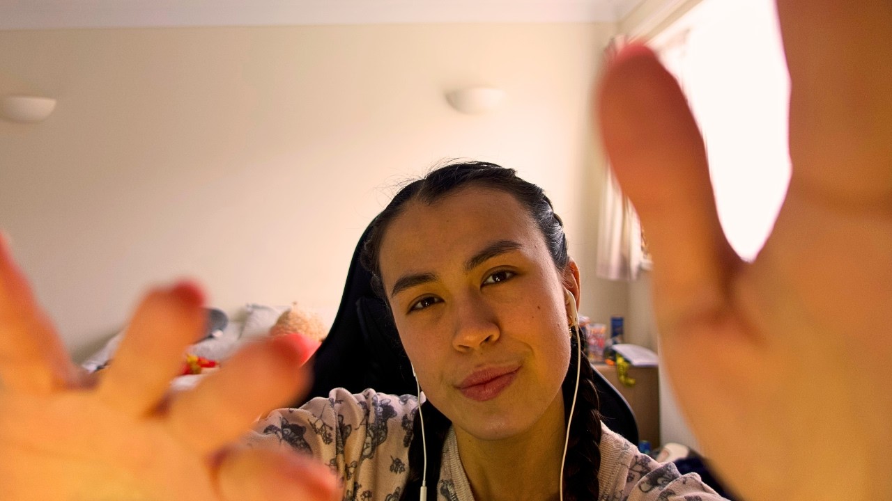 ASMR hand movements with gentle mouth sounds