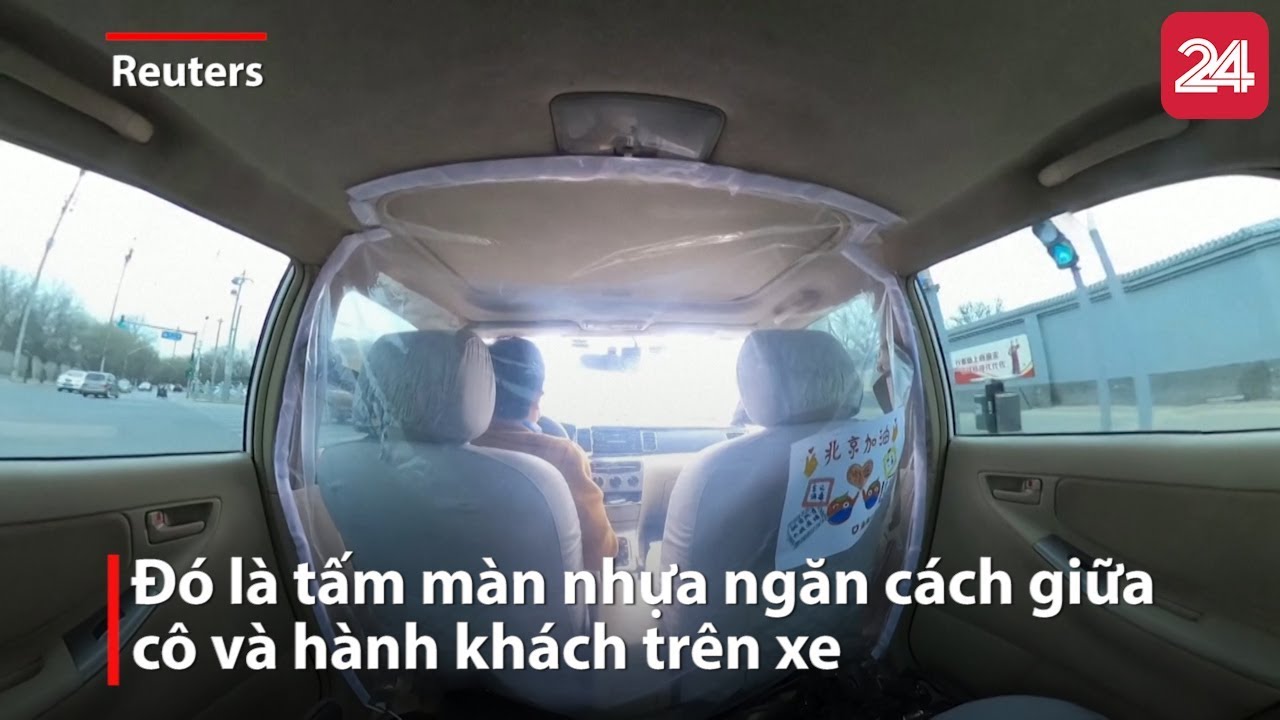 Tài xế taxi Trung Quốc lắp màn ngăn nhựa trên xe để ngừa Covid-19 ...