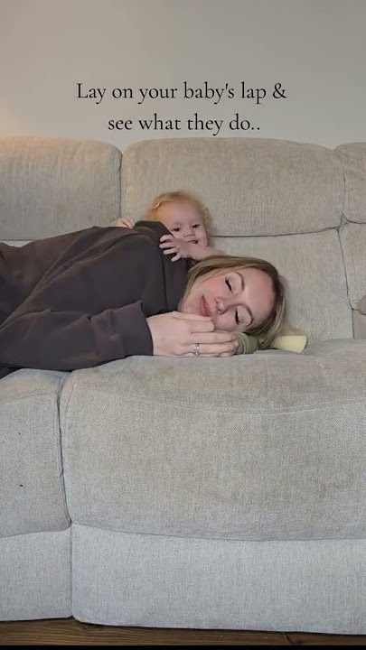 Lay on your baby's lap & see what they do..