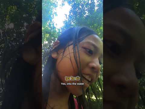 Mandi di sungai Tiu Roton
