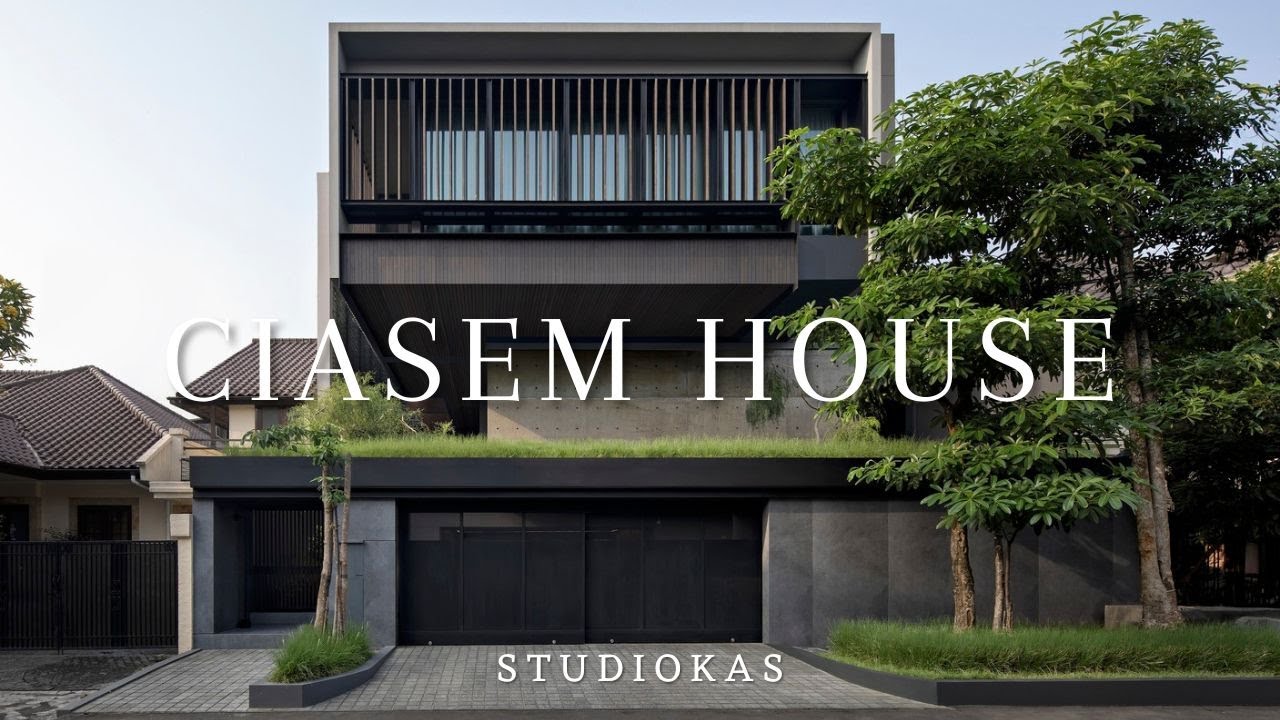 Проект дома с тремя коробками, сложенными и смещенными как основная форма дома