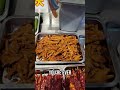 Street Food Adventure: Exploring Bizarre & Delicious Finds! #shorts