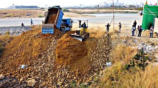 New Project!! Filling Stone By Dump Trucks 5Ton With Bulldozer Komatsu D31A Push Stone Delete Pond
