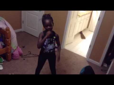 Little girl dancing in her room