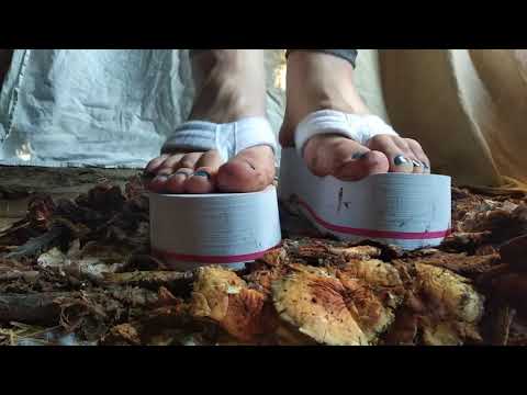 white flip flops on the platform to crush mushrooms