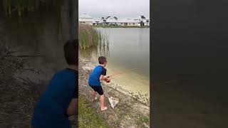 Little kid catches big fish