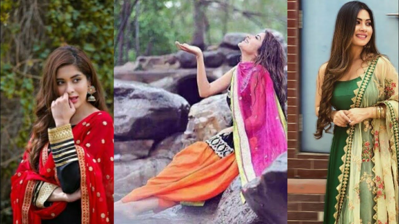 Premium Photo | Gorgeous girl side pose holding her dupatta with attitude  wearing desi dress for fashion photoshoot