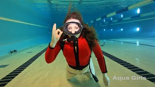 Red wetsuit scuba girl