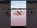GRUMMAN G-21A GOOSE TOUCH AND GO ON RIVER/FRONT VIEW/SHORTS
