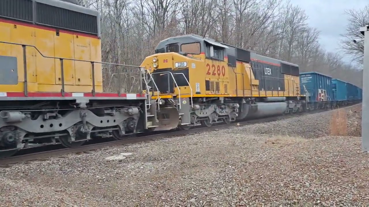 HEAR THE HORSEPOWER! four emd locomotives with 88 loaded cars