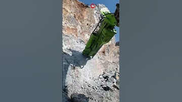 Rock splitting and drilling machine installed on Carter excavator