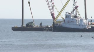 One found dead inside car that drove off Virginia Beach Fishing Pier