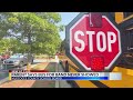Parent asks school board for apology after one school's marching band missed a community parade