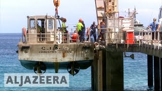 Manus Island officials start dismantling refugee camp