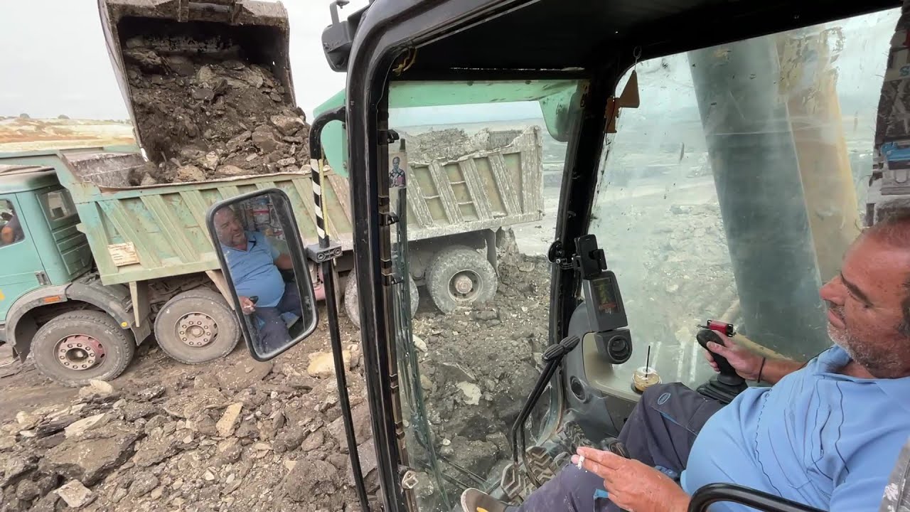 Caterpillar 365C Excavator Loading Mercedes & MAN Trucks With Three Passes