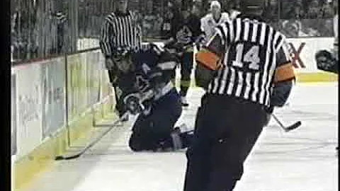Brad Isbister (Edmonton Oilers) vs Ed Jovanovski (Vancouver Canucks) October 11, 2003