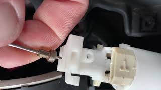 Showing how to disconnect " shift interlock cable" 2005 Dodge Magnum R/T
