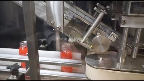 Inline Quill Capper Demonstration Running 8 oz liquid bottles