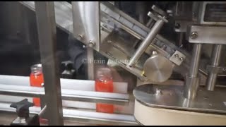 Inline Quill Capper Demonstration Running 8 oz liquid bottles