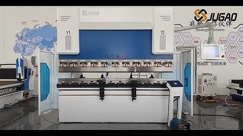 Hydraulic press brake with 6 axis back stops . Model of CNC controller is Cybelect Touch 15.