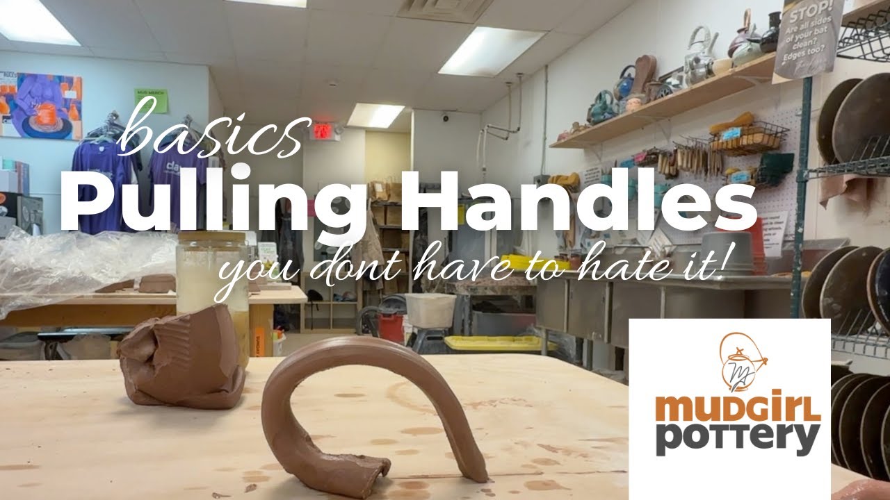 Video thumbnail of a freshly pulled handle curving on a studio table beside a lump of clay, under the words Pulling Handles