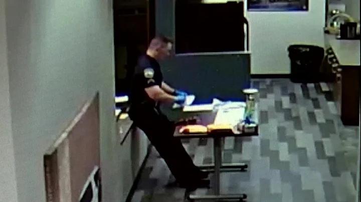 WATCH: Officer collapses while packing up drug evi...