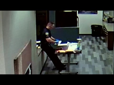 WATCH: Officer collapses while packing up drug evidence laced with fentanyl