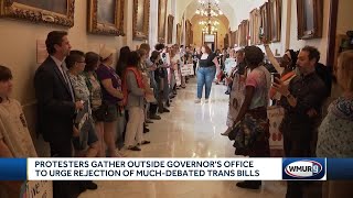 Protesters gather outside governor's office to urge veto of trans bills