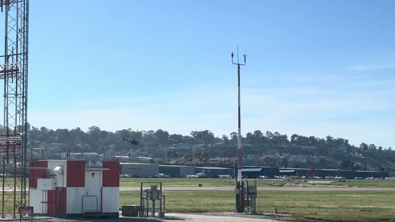Robinson R44 Helicopter taking off from Torrance Airport 