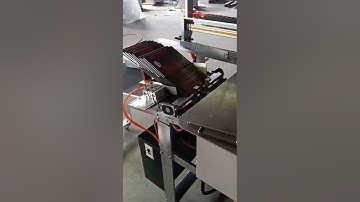 Automatic notebook elastic band insert machine for complete notebook and book case