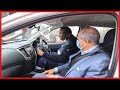 President Uhuru Kenyatta drives Euro 4 Mitsubishi L200 pickup after launch at State House Nairobi