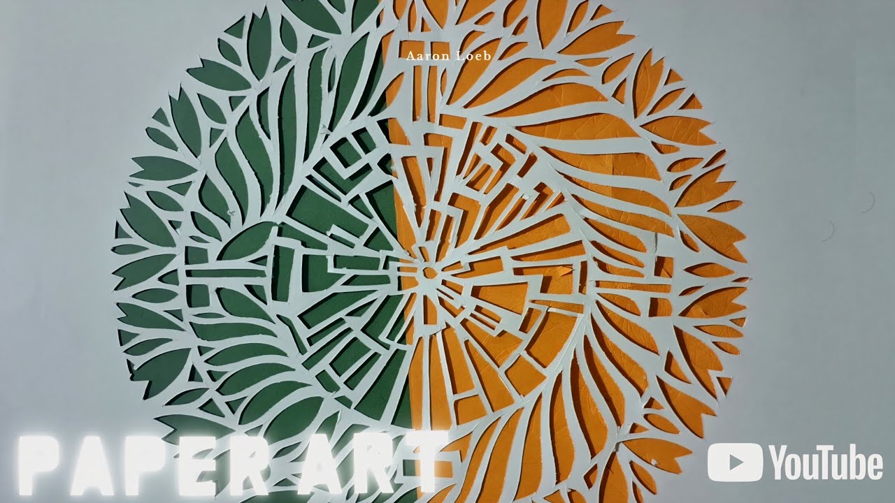Paper cutting art of block and floral design 