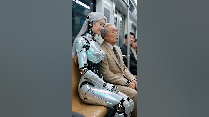 Un robot umanoide amichevole si siede con un uomo anziano su una metropolitana futuristica #Robot...