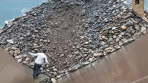 Barge unloading 4520 tons of large cobblestone - Relaxing natural stone flow sound