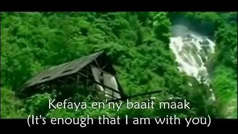 Wana Bin Edik Nancy Ajram (English and Arabic Lyrics).flv