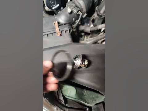 Is Subaru outback thermostat housing. tricky - YouTube