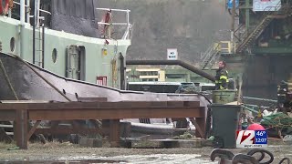 Crews investigating Fall River tugboat fire