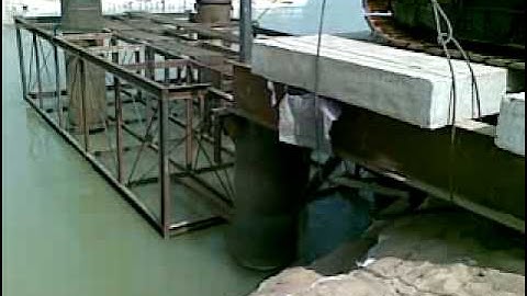 TEMPORARY BRIDGE CONSTRUCTION WITH SAND PILE OVER BRAHMANI RIVER