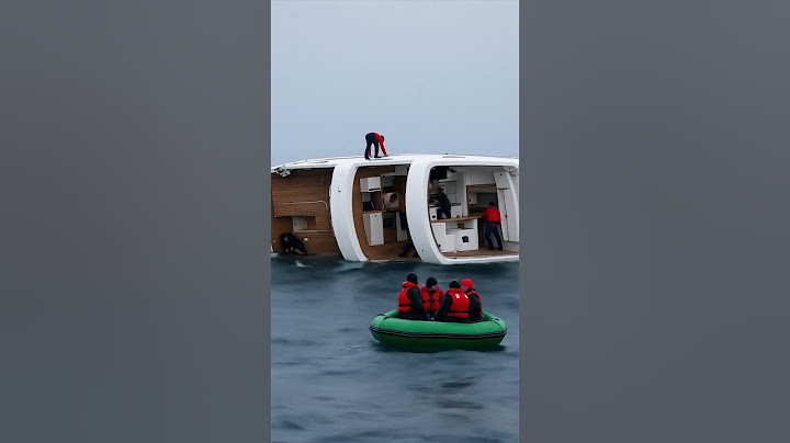 The luxury yacht started sinking due to a malfunction. People scrambled, saving belongings