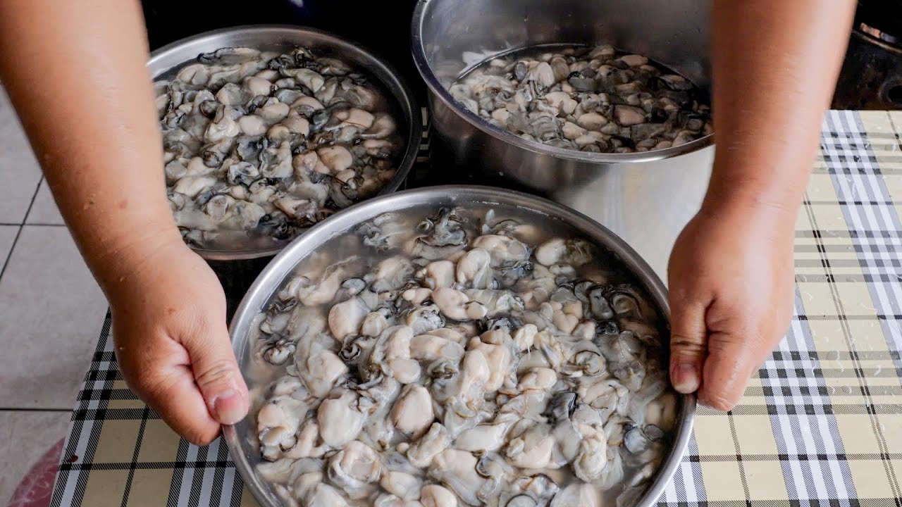 WOW ! A fist sized Oyster Pancake Loaded with Fresh Oysters Fried