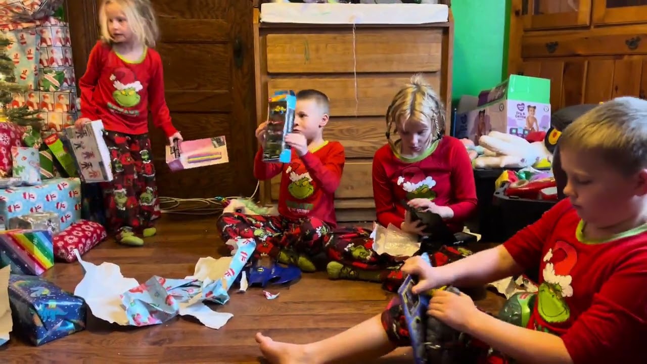 2023 Christmas. Kids opening presents.