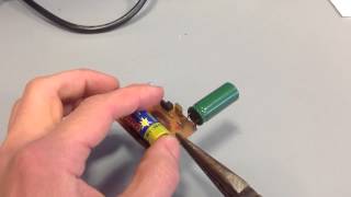 Discharging a capacitor from digital camera