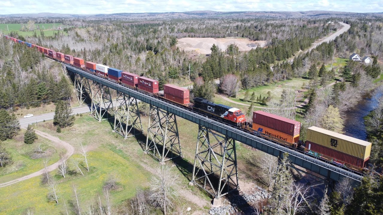 Awesome View in 4K! Big Stack Train CN 120 w/AC44C6M DPU on Trestle ...