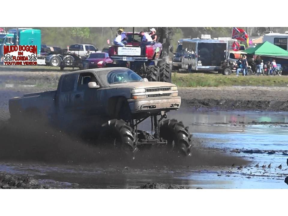 trucks in mud holes GMC Mega Truck...All out Septic..Kickin Mud @ IHMR