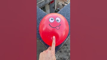 Experiment: Will a water balloon explode if it rolls down a tall building? 💥🎈 #sciencedaily