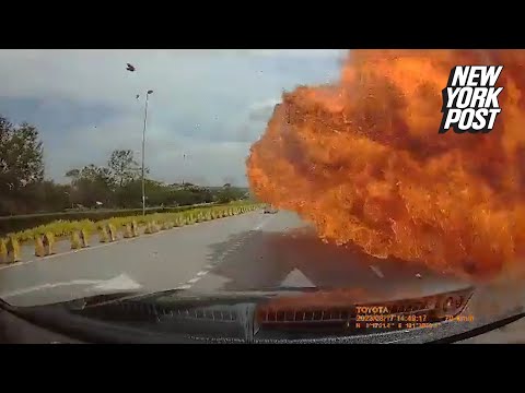 Horrifying moment private jet explodes in fireball when it crashes on road in Malaysia