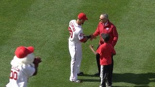 Manfred gives first pitch to scholar athlete