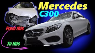 Rebuilding a wrecked a Mercedes C300 in 14 minutes.