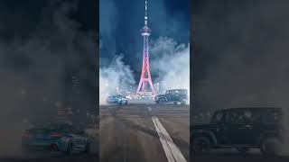 BMW car at Milad tower+Burj Khalifa.