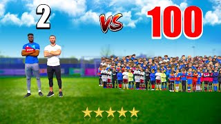100 Kids vs 2 PRO Footballers In A Soccer Match!